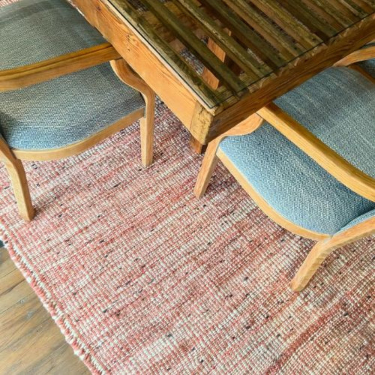 Handwoven merino wool rug in ecru and terracotta